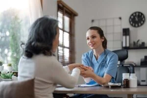a woman gets help understanding her insurance coverage for sober living